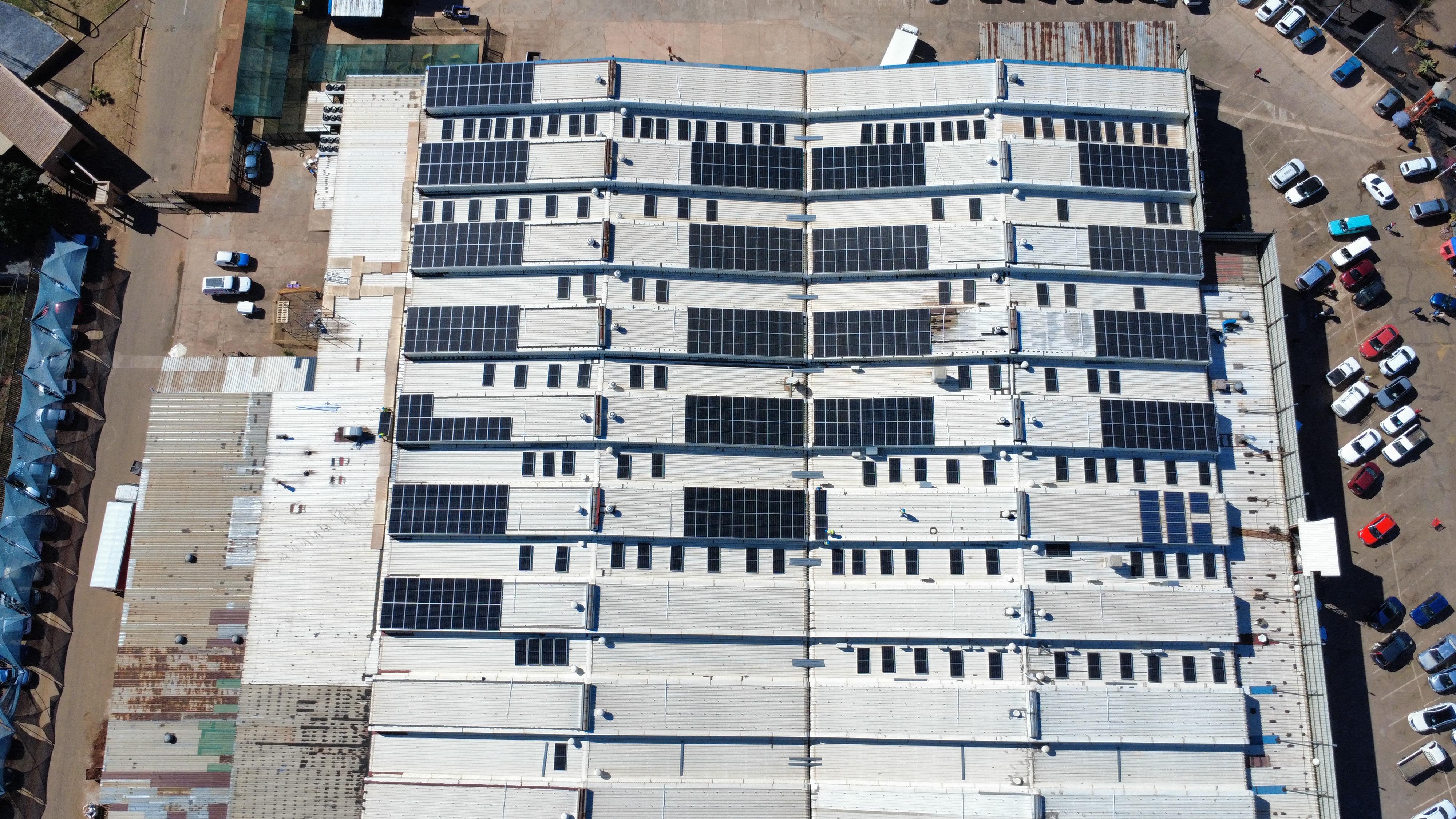 Commercial complex with rooftop solar installation delivered by Afribiz